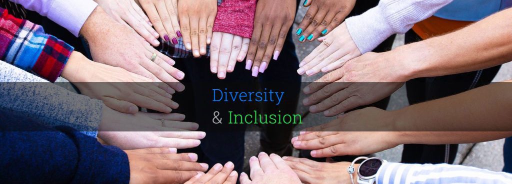 Hands belonging to persons of various skin tones meet to form a circle, text above reads Diversity & Inclusion
